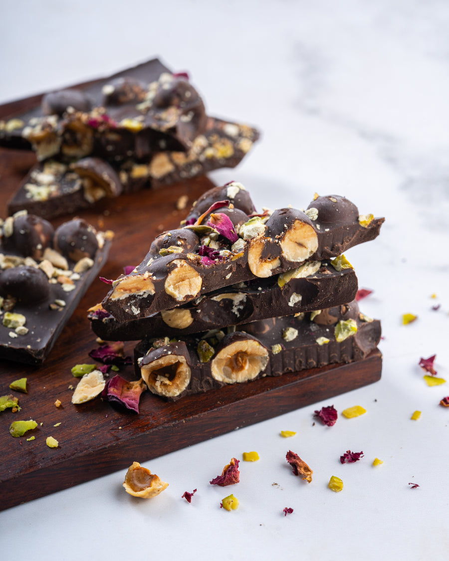 Intense Dark Chocolate with Roasted Hazelnuts with a Hint of Pista & Rose - 200gms
